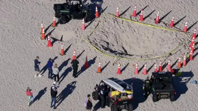 Tragedia en Florida: niña muere y otro menor en estado crítico tras caer en agujero en la playa